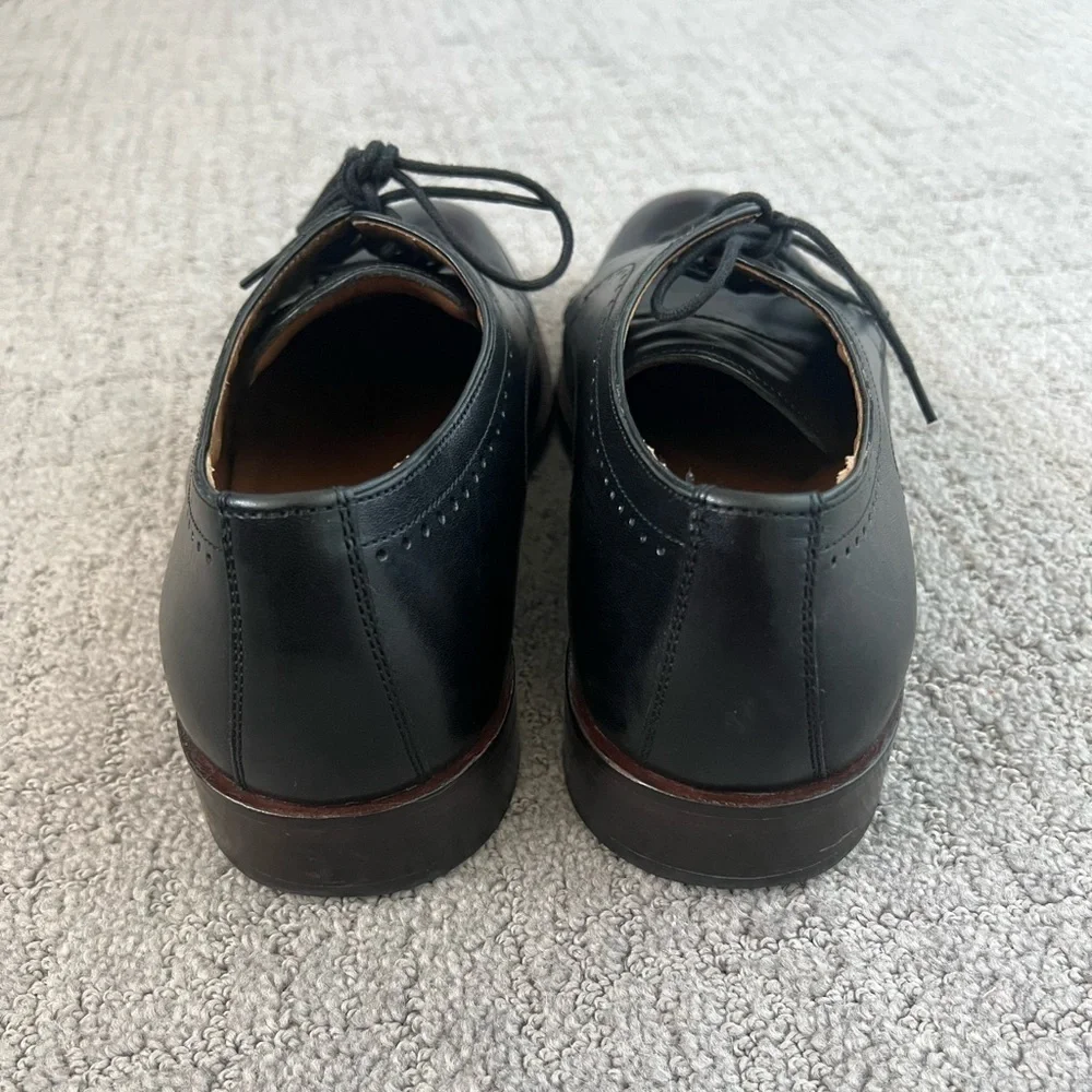 Johnston & Murphy Black Leather Wingtip Oxfords